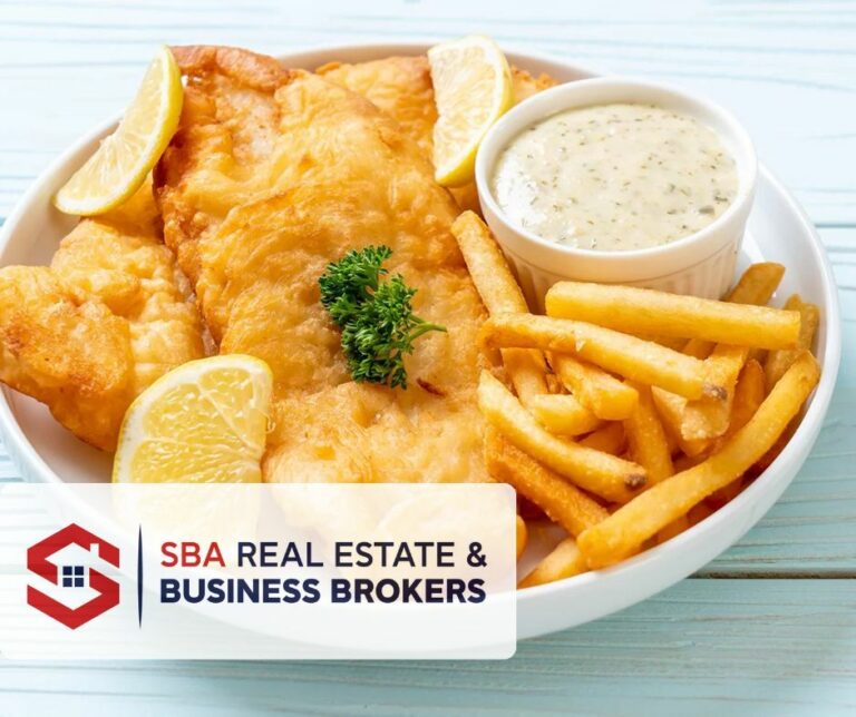 Delicious fish and chips with lemon slices.