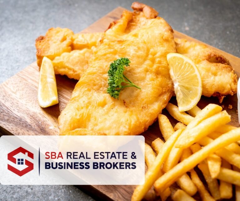 Delicious fish and chips with lemon garnish.