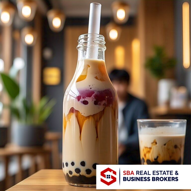 Glass bottle of layered bubble tea with straw.